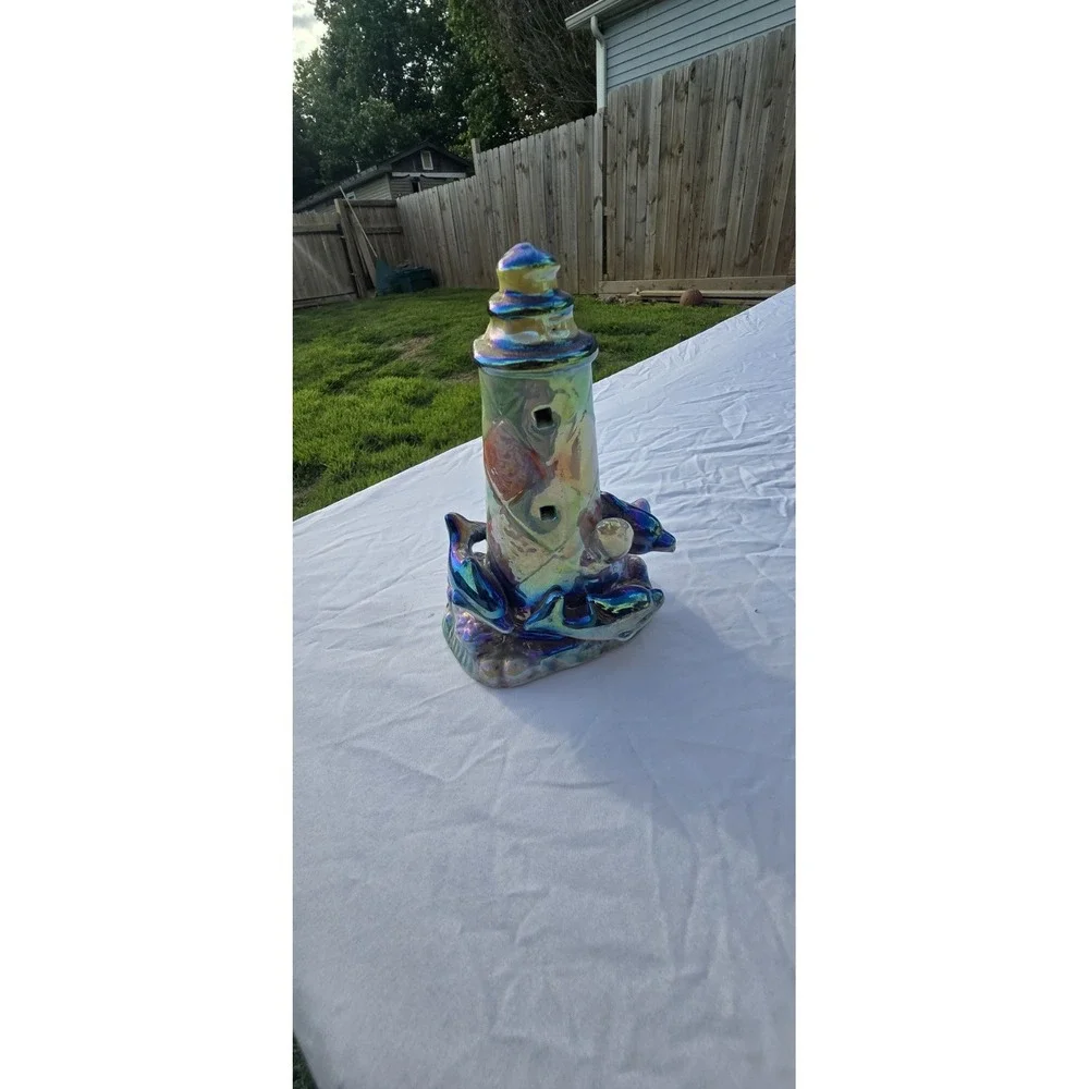 vintage iridescent ceramic dolphin lighthouse figurine